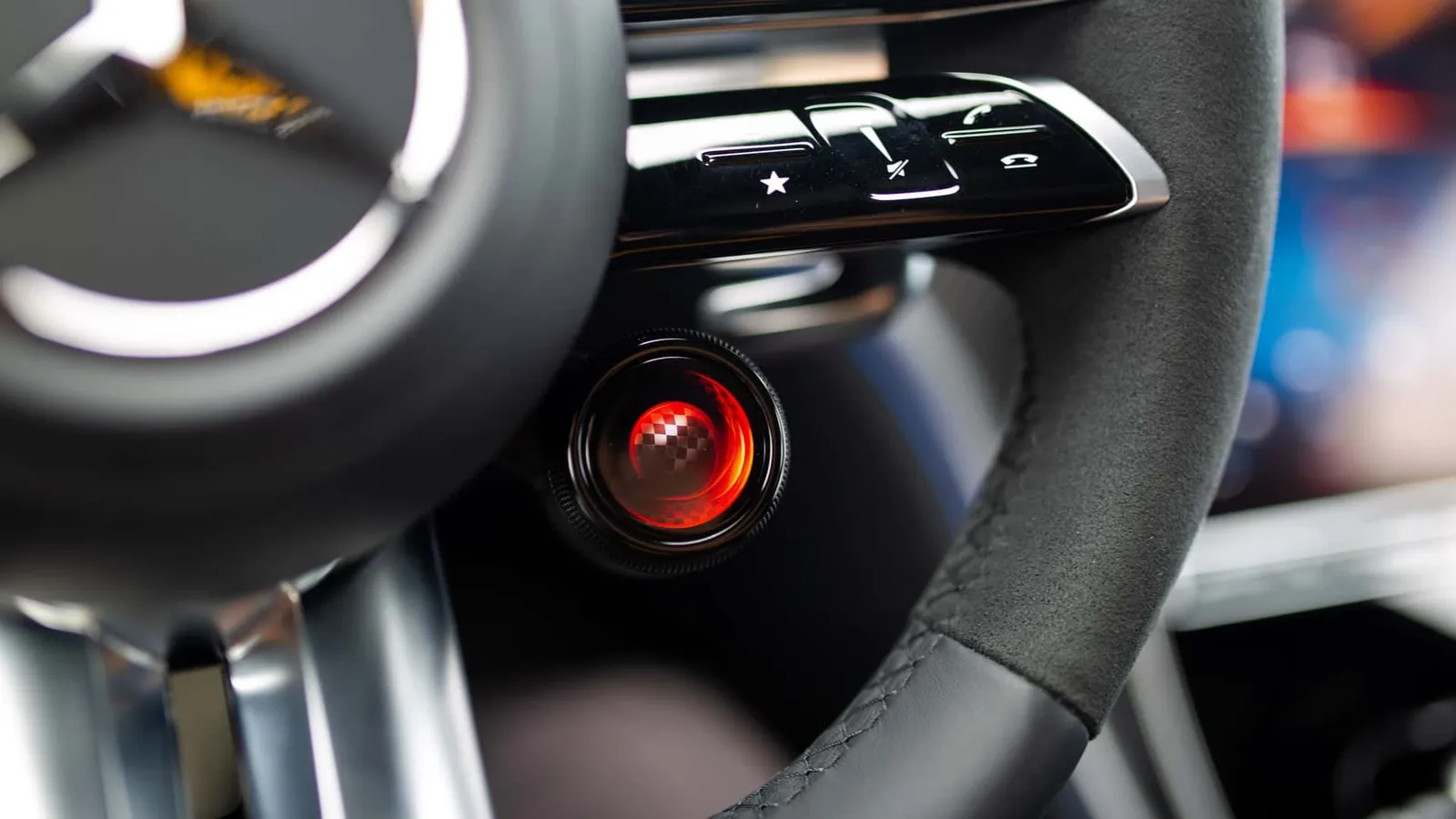 Botão de modos de condução no volante AMG